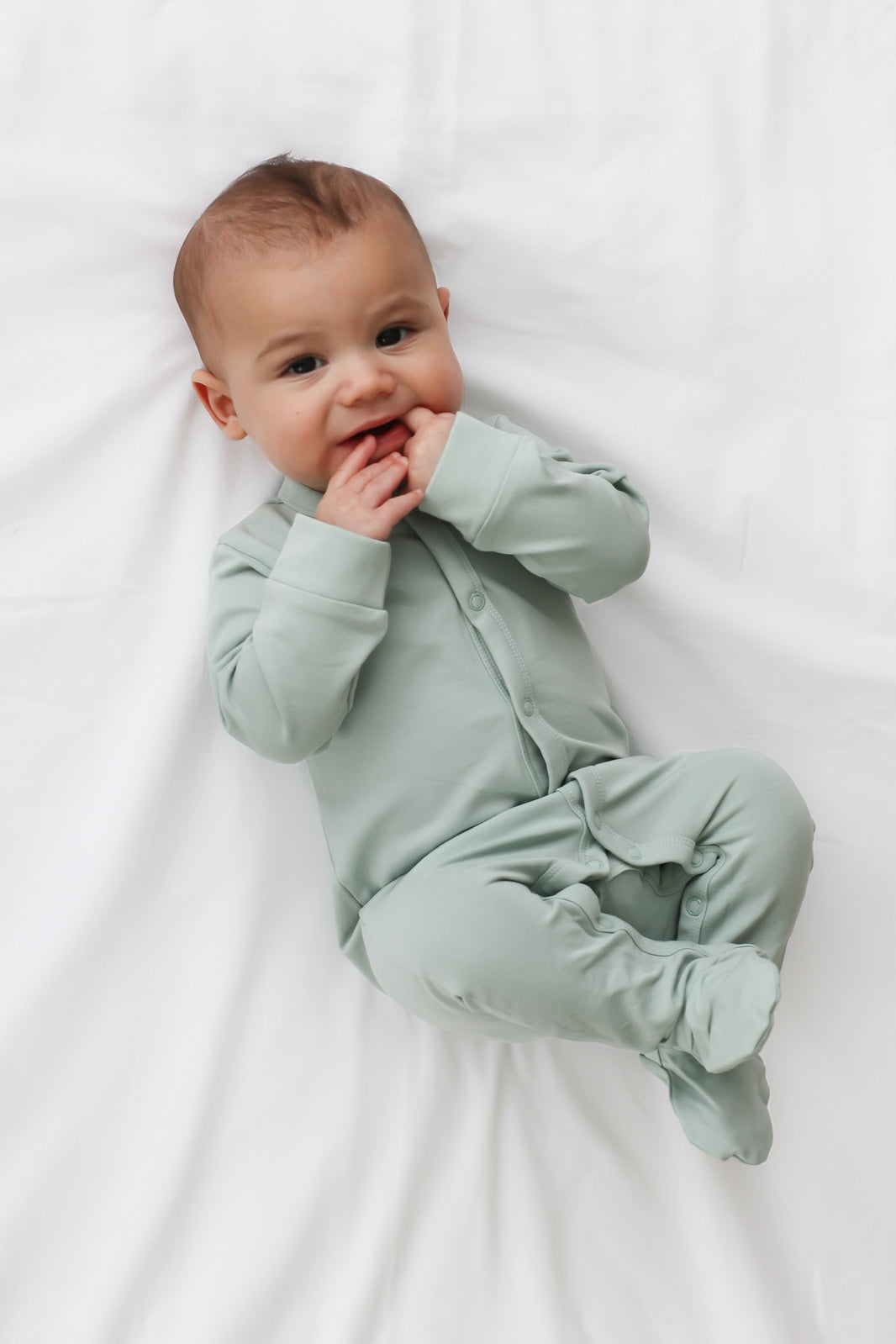 Essential Sleep Suit in Mist, designed by Burrow and Be